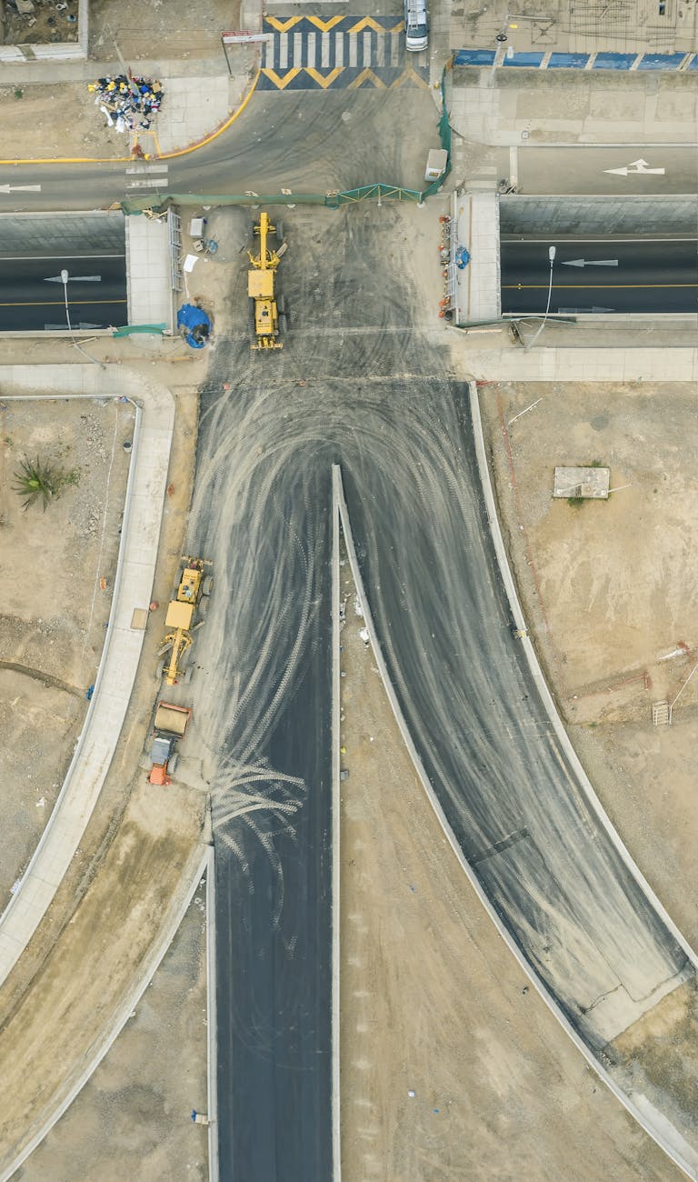 Aerial shot of road construction site in Lima, showcasing infrastructure development in Peru.
