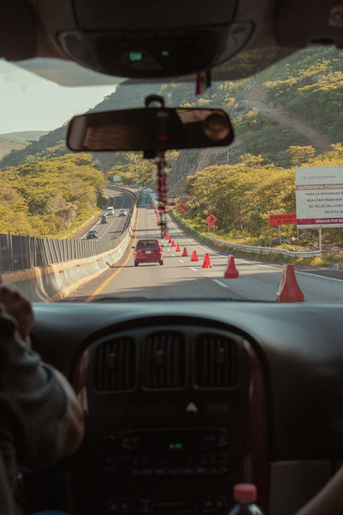 View from car interior of a road trip through Mexican mountains.